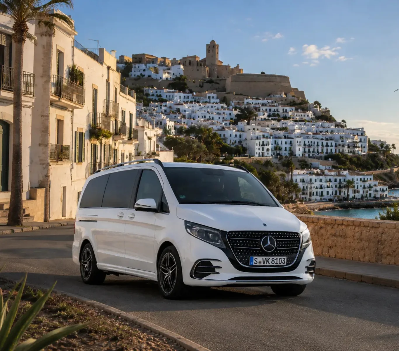Luxury Mercedes V-Class parked outside a private villa in Ibiza