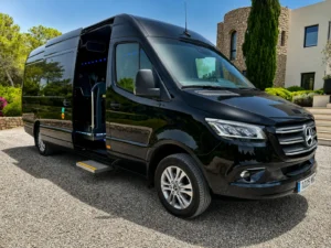 Luxury corporate client transport minibus service in Ibiza for executive events and business travel